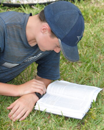 preteen reading the Bible